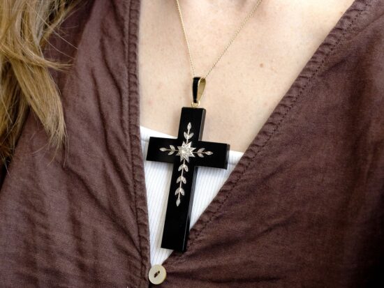 wearing onyx cross pendant