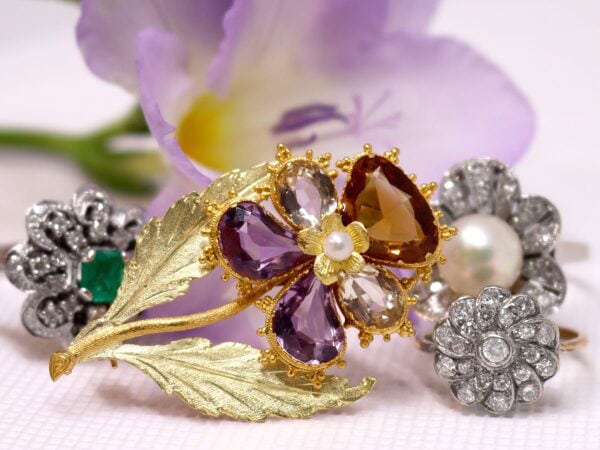 gold flower brooch gemstone with rings