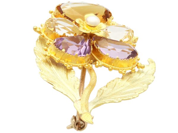 flower brooch with gemstones