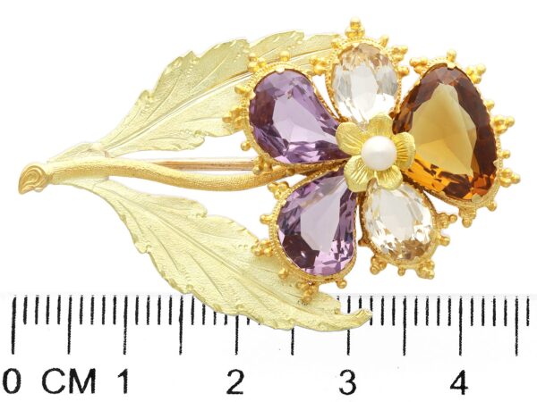 gold flower brooch gemstone size