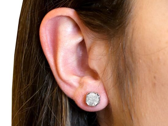 Platinum Earrings On Ear Closeup