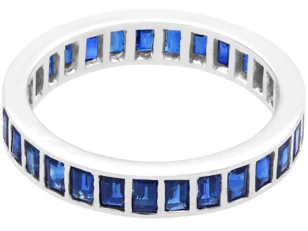 white gold baguette cut sapphire eternity ring