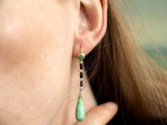 wearing jade and onys earrings