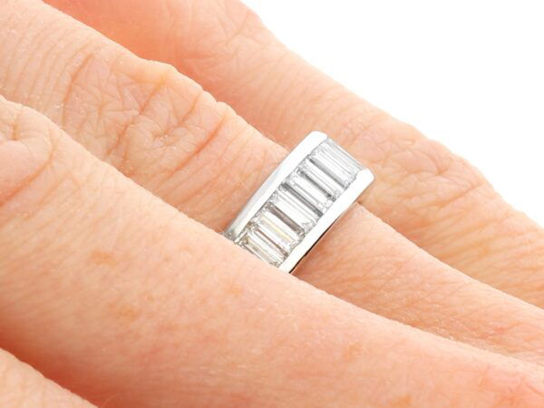 baguette diamond eternity ring on finger