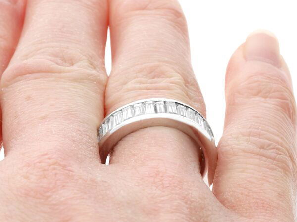 baguette diamond eternity ring on hand