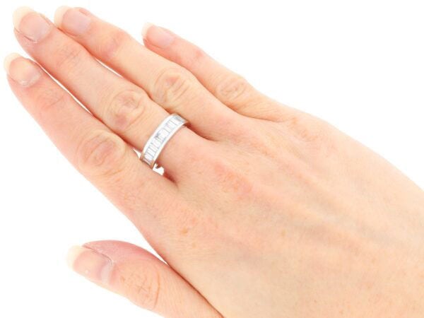 wearing a vintage baguette diamond eternity ring