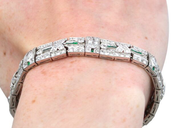 wearing a 1920s emerald diamond bracelet