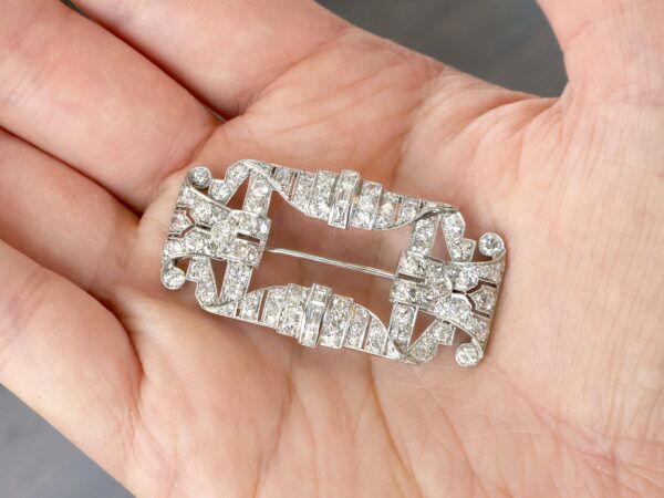 antique art deco diamond brooch in hand