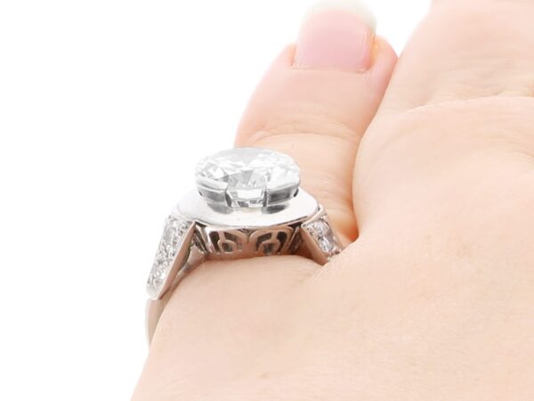 wearing 2.70 carat round brilliant cut diamond ring