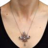wearing Edwardian diamond pendant in gold
