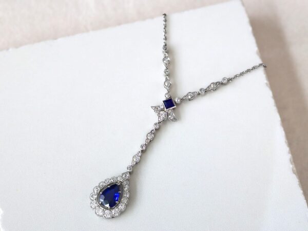 pear sapphire and diamond pendant in platinum