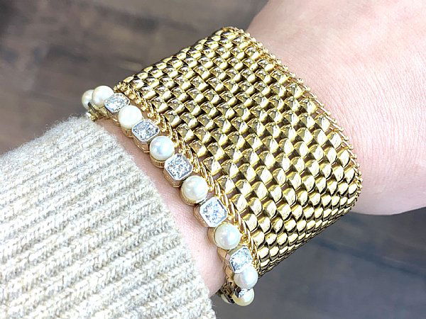 gold and gemstone bracelets stacked