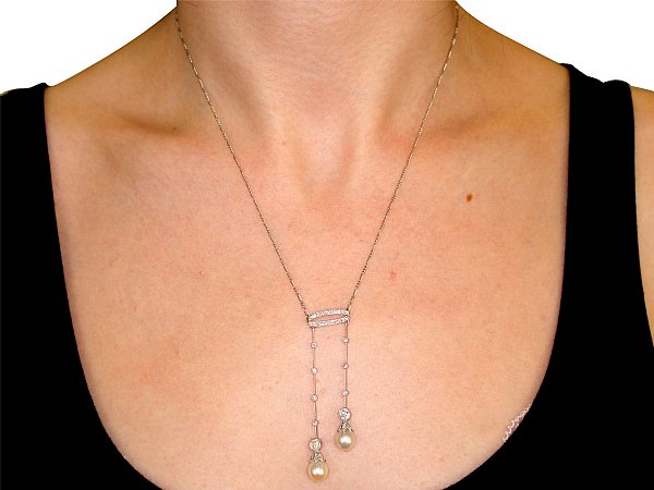 Wearing Pearl and Antique Diamond Necklace