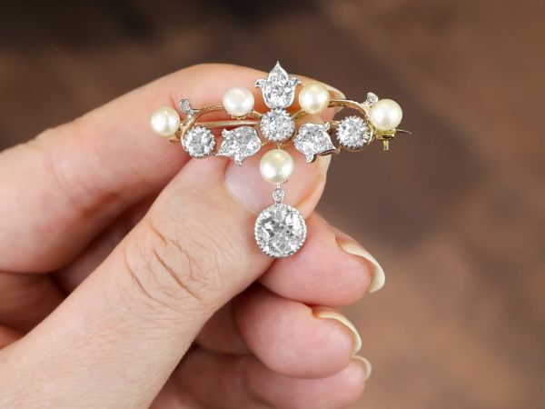Holding Antique Bridesmaid Pearl and Diamond Brooch