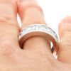 radiant cut diamond eternity ring on finger