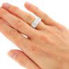 wearing a radiant cut diamond eternity ring