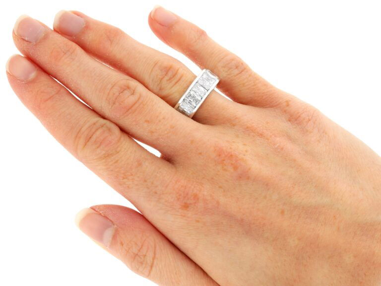 wearing a radiant cut diamond eternity ring