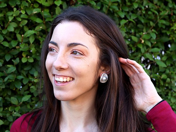 Wearing Pearl and Diamond Stud Earrings in Ears